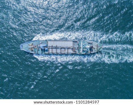 An aerial shot of an empty container ship.