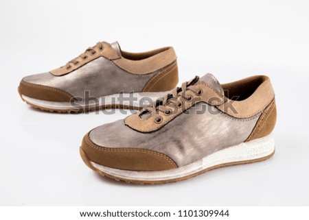 Female leather shoe on white background, isolated product, comfortable footwear.