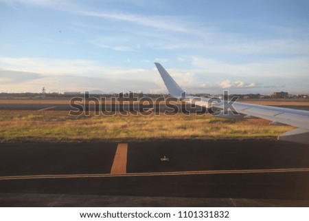 wing of the plane before takeoff