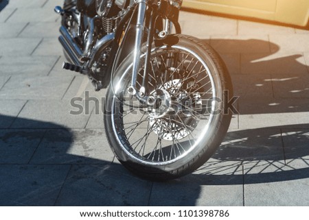 Wheel on a sport motobike. Motorcycle brake disc. Motorcycle tire.