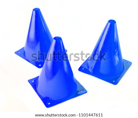 Three blue cone, road barrier isolated on a white background.