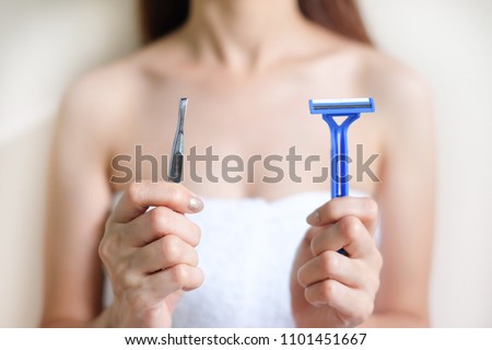 Hands are shaved, armpits or plucking the armpits by using a razor or tweezers, Depilation and skin care concept.
 Royalty-Free Stock Photo #1101451667