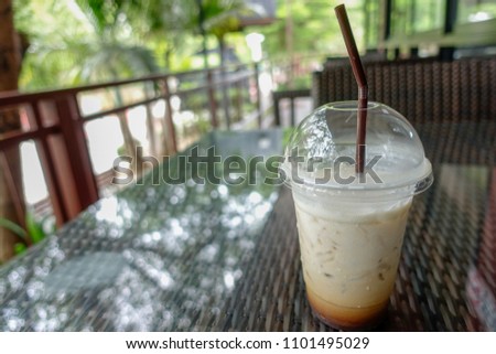 Ice coffee and on table