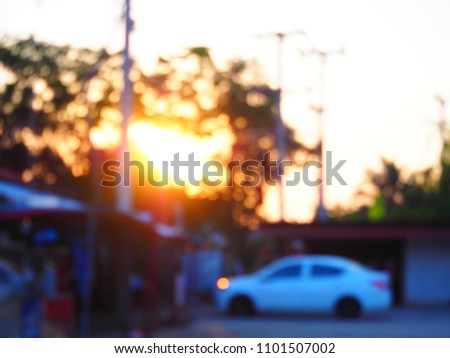 Parking lot with blurred background, Sunrise blur background. Blur background.  The rising sun on the blur background.