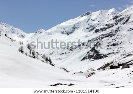 a beautiful view of the mountains peak  from the road  that leeds to the famous skiing resort Livigno, Italy