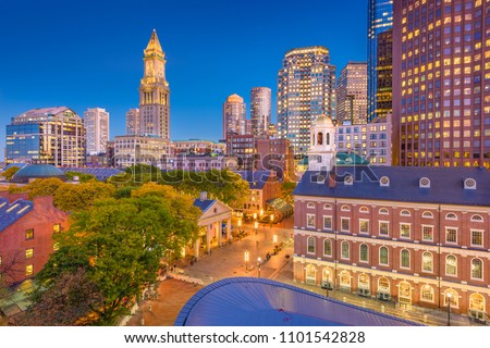 Boston, Massachusetts, USA downtown markets and cityscape at twilight.