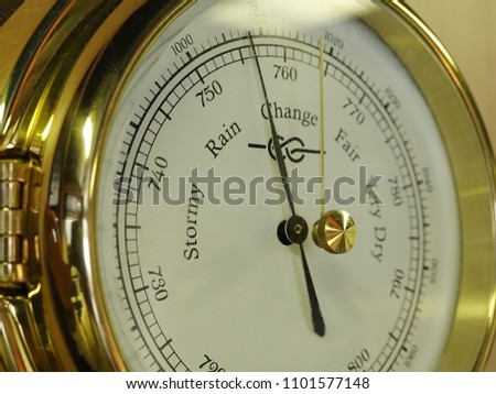 marine barometer measures atmospheric pressure Royalty-Free Stock Photo #1101577148