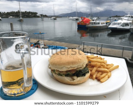 hamburger and beer in the outdoor