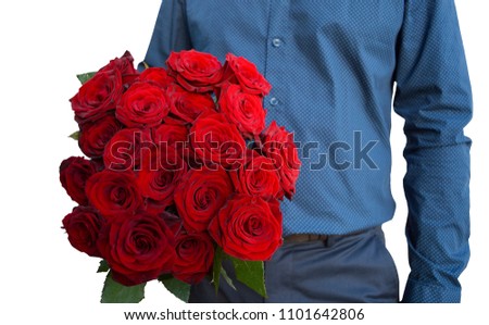 A man holds a bouquet in his hand - 21 red roses. Isolated image
