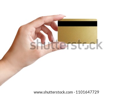 woman's hand  with french manicure holds gold blank business card or credit card on white background isolated