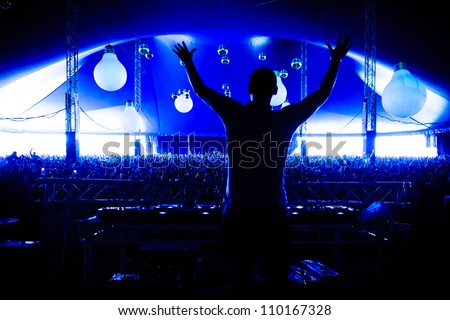DJ Afrojack Silhouette With Crowd at Creamfields Festival Royalty-Free Stock Photo #110167328