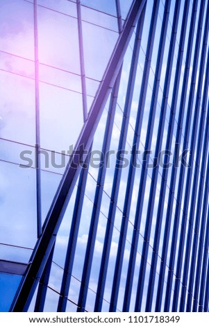 Finance business corporate building. Modern skyscrapers. Hi tech background. Low wide angle. Lens flare.