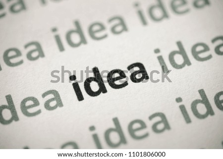 word idea printed on white paper macro