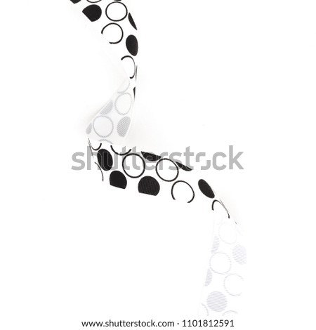 black and white point curly ribbon  isolated on white