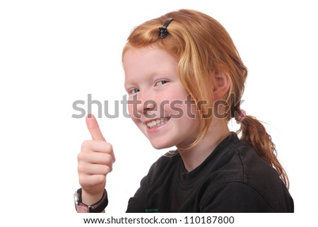 Smiling girl with thumbs up on white background