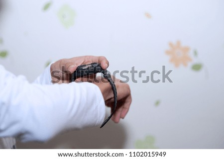 Hands and wrists black Digital time teller