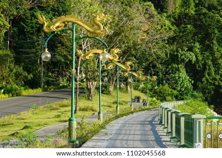 Walkway with the dragon lamp-post at Khao-Khad viewpoint, Phuket, Thailand