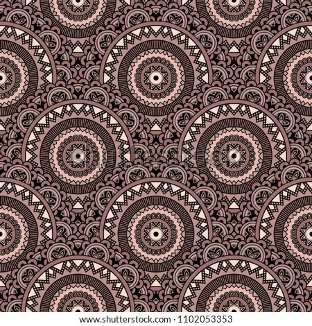 Abstract seamless backdrop. Round colorful texture in dusty rose and black colors. Mandala background. Oriental pattern for design