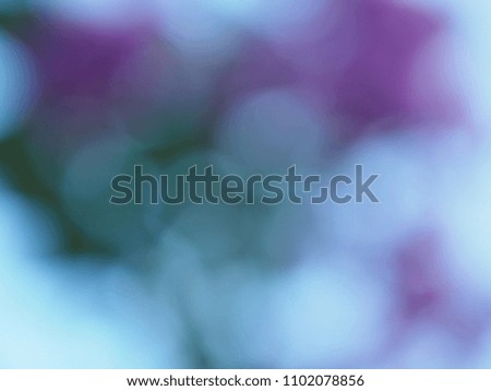An abstract background of white and purple bokeh