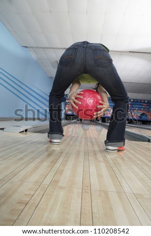 Woman holding a bowling ball