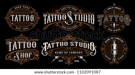 Set of vintage tattoo emblems, logos, badges, shirt graphics. Tattoo lettering illustration. All elements, text are on the separate layer. (VERSION FOR DARK BACKGROUND). Royalty-Free Stock Photo #1102091087