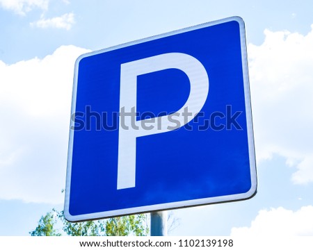 Blue square parking lot sign