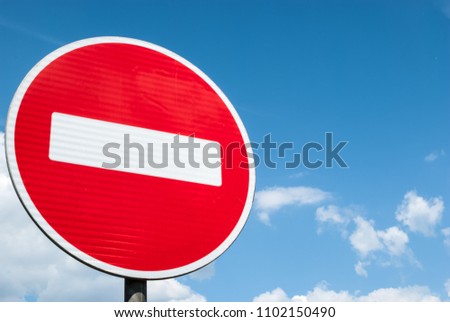 Red and white no entry road sign