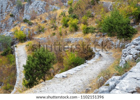 Mountain winding Hiking trail, close up. Beautiful nature landscape. Kotor, Montenegro. Horizontal Wallpaper
