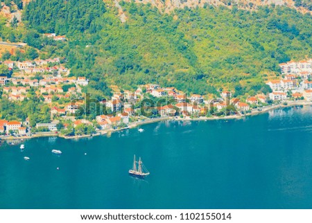 Kotor, Montenegro. Beautiful landscape. Scenic top view on one of the most popular places on Adriatic Sea. Boka Kotorska bay in summer sunny day.