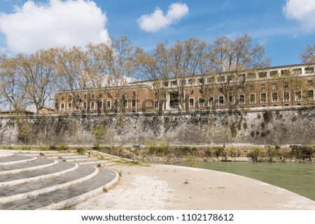 Wide angle picture of beautiful Tiber River during sunny day in Rome, Italy