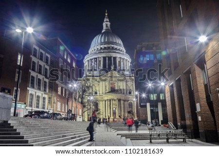 London. Stunning aerial view of St. Paul Cathedral and city skyline at dusk.