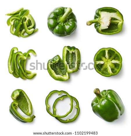 Set of fresh whole and sliced sweet green pepper isolated on white background. Top view Royalty-Free Stock Photo #1102199483