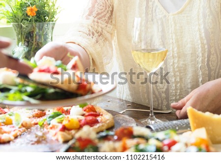Woman enjoying a pizza dinner