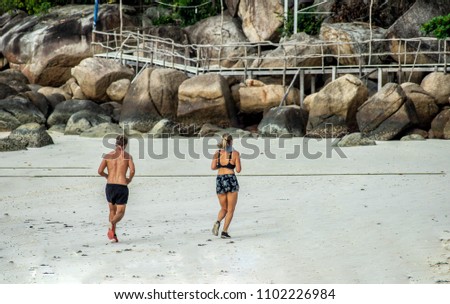 Couple Running Outdoors Beach Concept