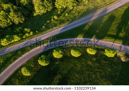 Aerial shot of some road in summer. Bird's eye view of a highway in Ukraine