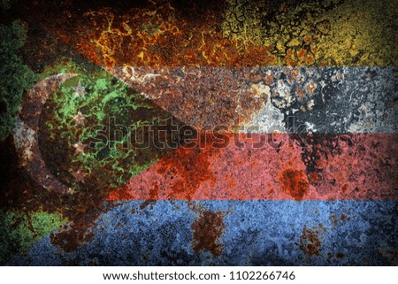 Comoros flag pattern on old rusty metal texture