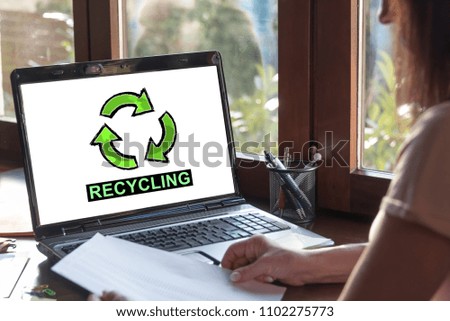 Laptop screen displaying a recycling concept
