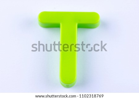 letter T uppercase alphabet isolated made of plastic on white background with shadows