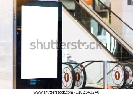 Blank white screen ads monitor in department store.