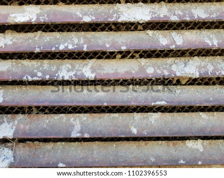 old metal grill with rust