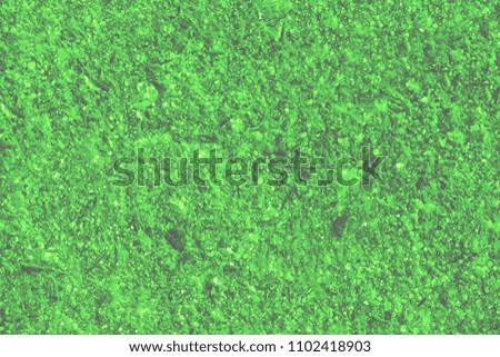 Seamless texture of a rough concrete wall of a green color.