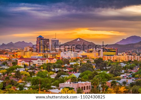 Tucson, Arizona, USA downtown skyline with Sentinel Peak at dusk. (Mountaintop "A"  for "Arizona") Royalty-Free Stock Photo #1102430825
