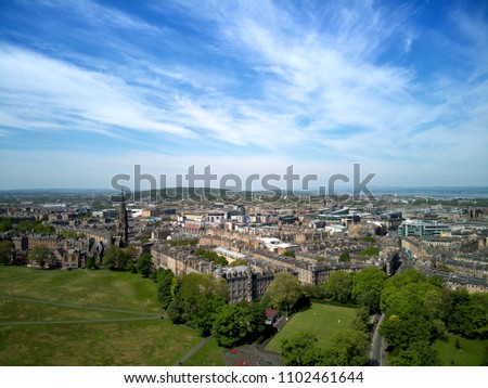 Aerial drone sunrise view of suburban houses in Edinburgh, Scotland, UK