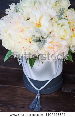Vintage box with beautiful white peony flowers