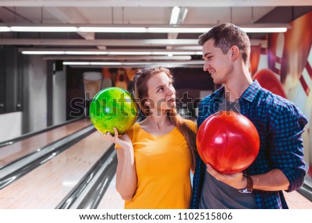Couple at bowling alley