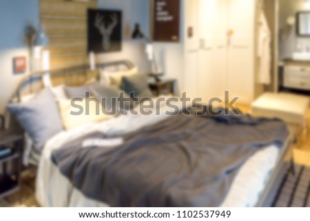 Abstract blur bedroom interior for background usage