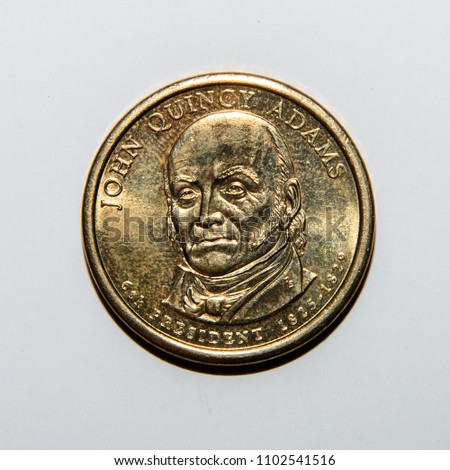 1 dollar coin with the image of John Quincy Adams, 6th president of the United States of America (1825-1829) Royalty-Free Stock Photo #1102541516