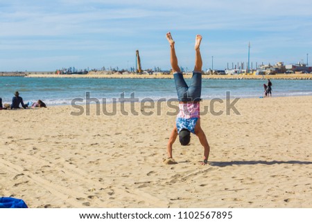 A boy enjoying the beach of Essaouira
