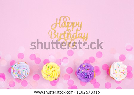 Creative pastel fantasy holiday card with cupcake and happy birthday lettering. Baby shower, birthday, celebration concept. Horizontal