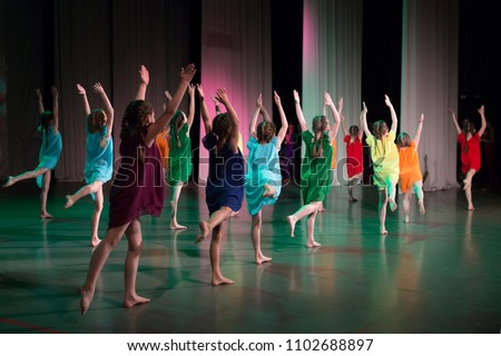 Girls are dancing on stage. Royalty-Free Stock Photo #1102688897